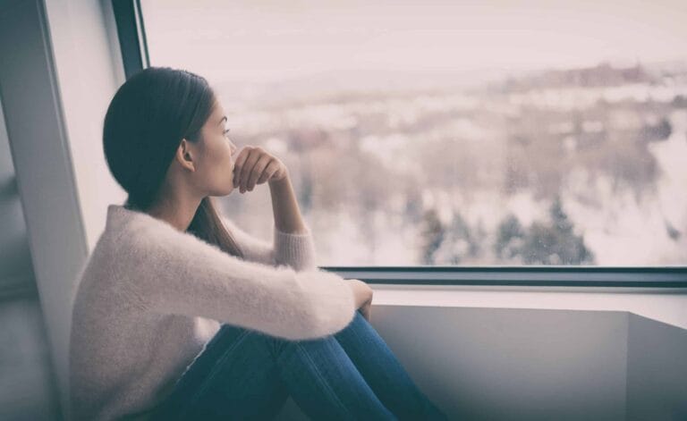 Woman suffering from seasonal affective disorder