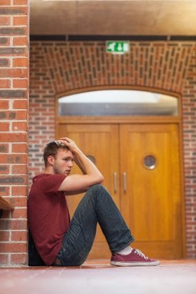 College student struggling with high-functioning depression symptoms