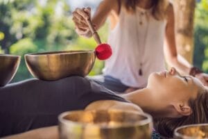 Woman healing through sound therapy