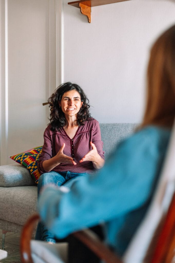 Woman speaking with therapist for depression