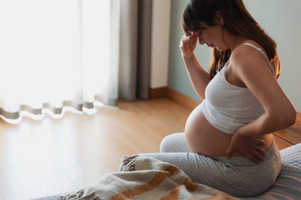 Woman trying to manage her anxiety during pregnancy